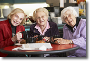 three senior woman smiling