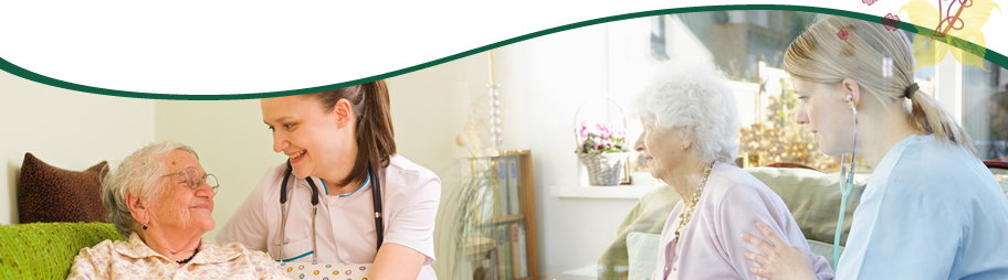 caregiver conforting senior woman at home
